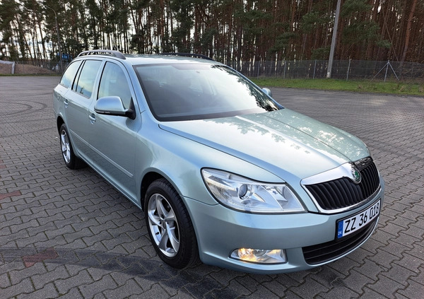 Skoda Octavia cena 24800 przebieg: 153000, rok produkcji 2009 z Pabianice małe 352